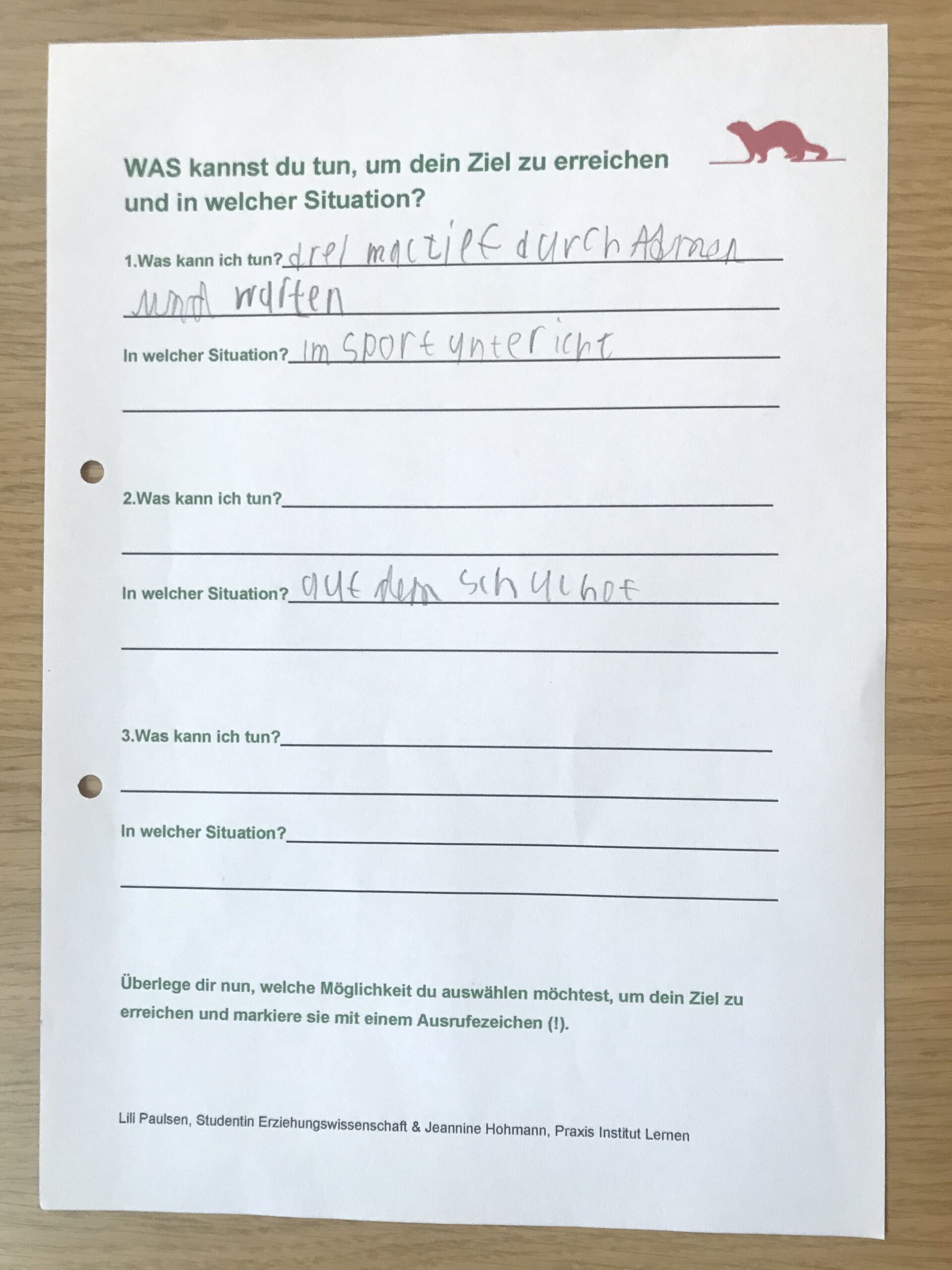 Handschriftlich ausgefülltes Arbeitsblatt auf Papier